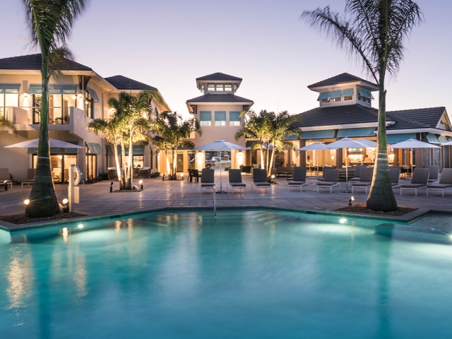 Enjoy sunset cocktails poolside in the Bahamas